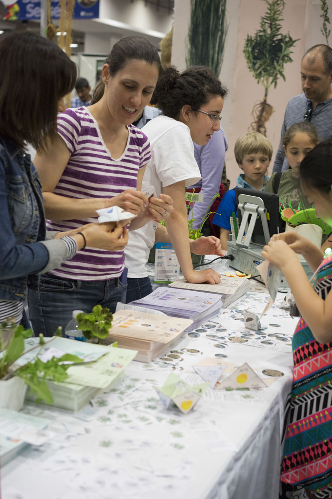 BSA volunteers present origami activity at USASEF booth in Washington D.C.